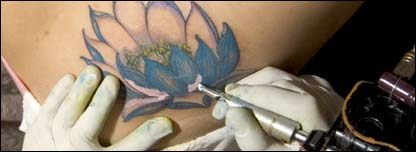  A tattoo being applied on someones skin