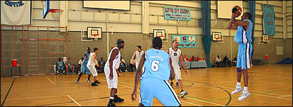 A basketball player taking a shot