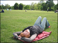 Woman relaxing in Hyde Park, London