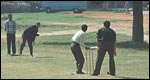 People playing cricket in India