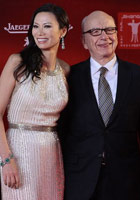 Mr. Murdoch and his wife