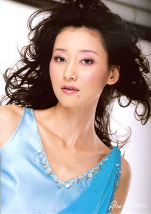 资料图片:09年明星妈妈和爸爸-郭桦