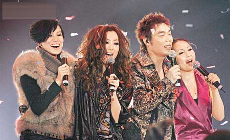 郑秀文许志安台上打情骂俏共唱情定之歌(图)_