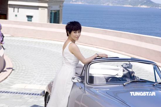 刘嘉玲拍广告性感爆乳 化身007女主角【图】