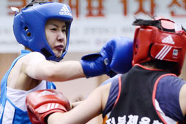 ��ͼ��Ů�ǲμӹ��Ҷ�ѡ��ȭ�����׳���ʤ