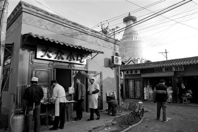 西城白塔寺人口疏解_...的违建被拆除.西城区新街口街道相关负责人表示,今年(2)