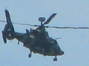 图为外媒转载的改进型武直-19，这架新出现的直升机的旋翼顶端安装了一部毫米波探测雷达。