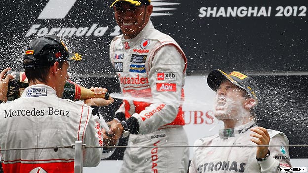 The top three finishers in the Chinese Grand Prix