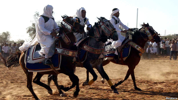 Horsemen wearing traditional Libyan clothes