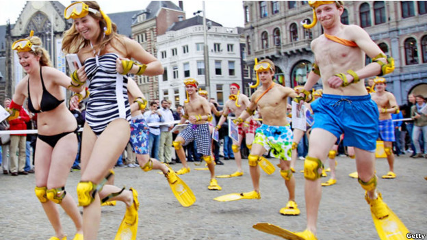 People participate in the National Flipper Race in Amsterdam 