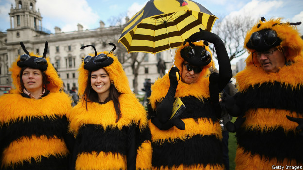 People dressed as bees protest in London against the use of pesticides