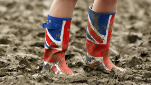 Wellington boots in the mud at the Glastonbury festival