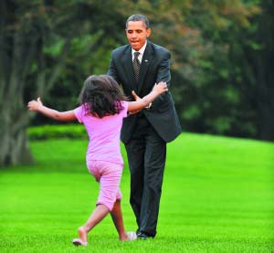 回到家奥巴马还是爸爸(组图)