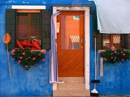 Waterways lined with painted bright house