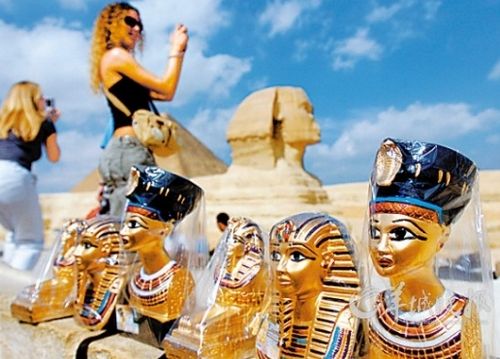 Tourists suburb in the Egyptian capital Cairo to watch the Giza Pyramid group and Sphinx