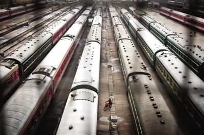 Xuzhou is a major transportation hub. Trains dense docked in peace under the bridge.
