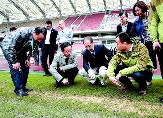 武汉的足球范儿:东亚杯受考验 巴萨总监愿常驻