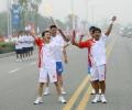 图文-北京奥运圣火在安阳传递 张海希与彭国奇合影