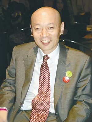 本报记者 吴泽明"爸爸,你看!那个人真像葛优!