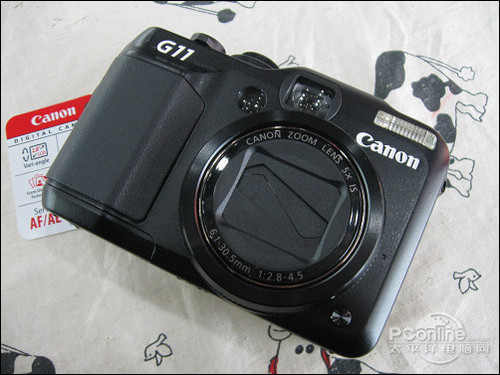 外观方面,作为一款旗舰相机,佳能 powershot g11的机身手感沉甸甸的