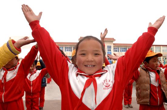 图片 正文  3月20日,拉萨市城关区吉崩岗小学的学生在做课间操.
