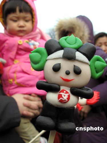 图:北京庙会面人儿奥运福娃受欢迎