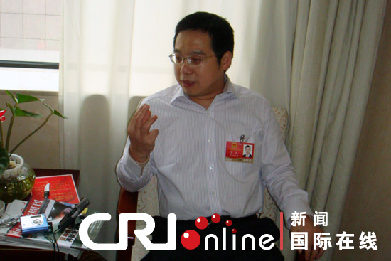 全国人大代表,贵州务川县县长陈实 摄影:李琳国际在线消息(记者李琳)