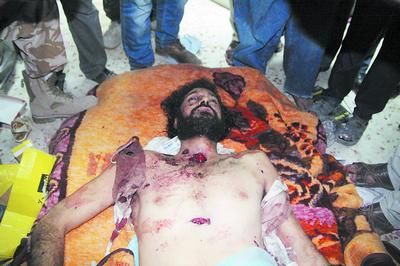 是谁杀死了卡扎菲?