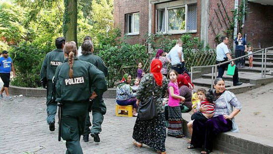 德媒:外来贫困移民影响德国社会安定(图)