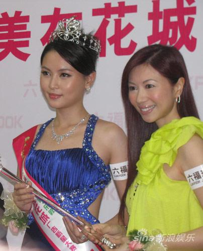 前香港小姐冠军杨宝玲着单肩黄色镶钻t恤亮相广州,出席六福"第十六届