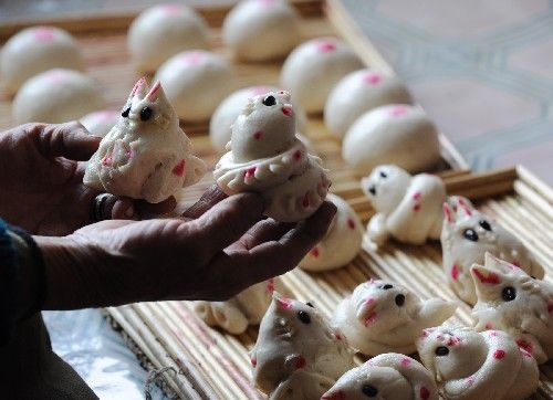 山西寒食"蛇盘兔" 来源:新浪广州