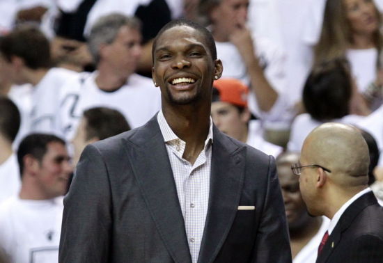 图文季后赛凯尔特人负热火波什西装场边观战