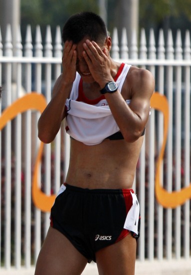 图文亚运男子20公里竞走王浩夺冠朴七成很痛苦